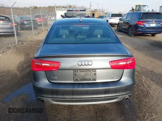 2014 Audi A6 Prestige with VIN WAUHGBFC8EN104920, listed as a IAAI auction lot 41827864 with 70,289 mi miles and . Bid and sale history available at DreamBid. Image 16.
