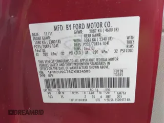 2012 Ford Escape XLS z VIN 1FMCU9C75CKB34585, wystawiony jako IAAI lot #42472033 z przebiegiem 184 695 mil mil oraz . Historia ofert i sprzedaży dostępna na DreamBid. Obrazek 9.