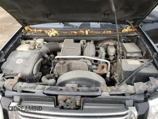 2007 GMC Envoy SLT with VIN 1GKDT13S972197393, listed as a Copart auction lot 77958764 with 151,586 mi miles and Salvage Title. Bid and sale history available at DreamBid. Image 12.