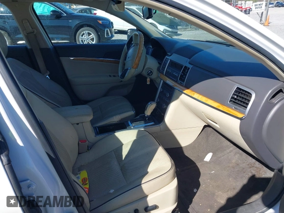 2011 Lincoln MKZ Hybrid with VIN 3LNDL2L38BR774327, listed as a IAAI auction lot 41820314 with 212,355 mi miles. Bid and sale history available at carsss.com. Image 5.