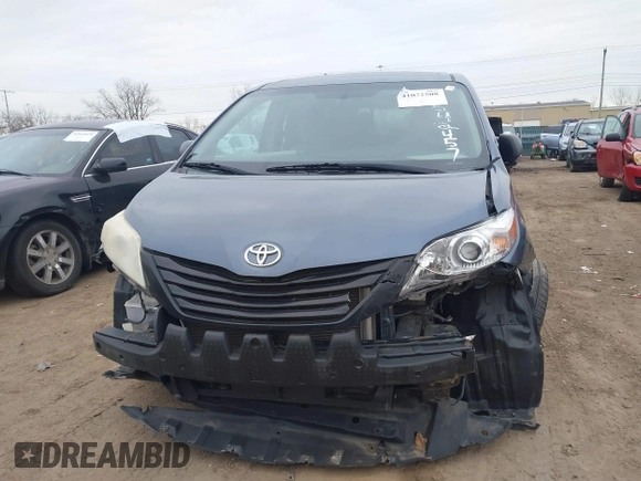 2015 Toyota Sienna L with VIN 5TDZK3DC6FS542457, listed as a IAAI auction lot 41072508 with 167,509 mi miles and . Bid and sale history available at DreamBid. Image 6.