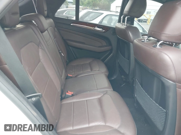 2014 Mercedes-Benz M 550 with VIN 4JGDA7DBXEA328591, listed as a IAAI auction lot 42487544 with 122,136 mi miles and . Bid and sale history available at DreamBid. Image 8.