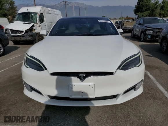 2019 Tesla Model S 100D with VIN 5YJSA1E44KF335113, listed as a Copart auction lot 82936844 with 89,770 mi miles and Salvage title. Bid and sale history available at DreamBid. Image 5.
