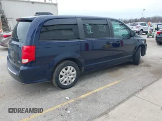 2015 Dodge Grand Caravan American Value with VIN 2C4RDGBG2FR615100, listed as a IAAI auction lot 42002131 with 178,507 mi miles and . Bid and sale history available at DreamBid. Image 4.