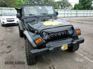 2005 Jeep Wrangler Unlimited with VIN 1J4FA44S75P358246, listed as a Copart auction lot 60958695 with 150,003 mi miles and Salvage title. Bid and sale history available at DreamBid. Image 13.