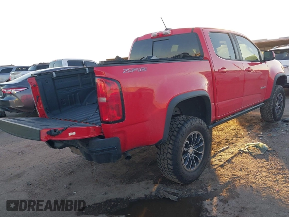 2018 Chevrolet Colorado 4WD ZR2 with VIN 1GCGTEEN7J1155034, listed as a IAAI auction lot 41157795 with 54,005 mi miles. Bid and sale history available at carsss.com. Image 4.