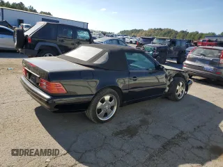1999 Mercedes-Benz SL-Class with VIN WDBFA68F1XF184891, listed as a Copart auction lot 77082284 with 96,379 mi miles and Salvage Title. Bid and sale history available at carsss.com. Image 3.