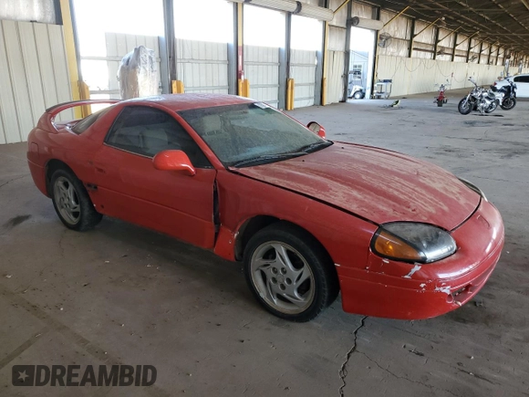 1999 Mitsubishi 3000GT z VIN JA3AM44H3XY001394, wystawiony jako Copart lot #75942814 z przebiegiem 75 146 mil mil oraz Czysty tytuł • Clean title. Historia ofert i sprzedaży dostępna na DreamBid. Obrazek 4.