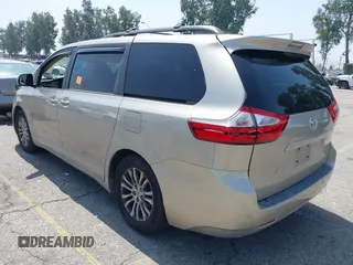 2015 Toyota Sienna XLE with VIN 5TDYK3DC4FS560743, listed as a IAAI auction lot 42488745 with 145,009 mi miles and . Bid and sale history available at DreamBid. Image 3.
