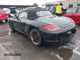2012 Porsche Boxster with VIN WP0CA2A88CS710105, listed as a IAAI auction lot 41155672 with 108,103 mi miles. Bid and sale history available at carsss.com. Image 3.