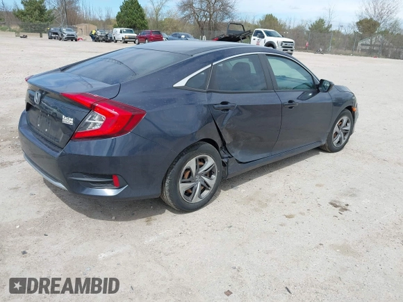 2019 Honda Civic LX with VIN 2HGFC2F61KH564474, listed as a IAAI auction lot 42156385 with 239,694 mi miles and . Bid and sale history available at DreamBid. Image 4.