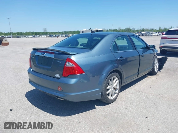 2012 Ford Fusion SEL with VIN 3FAHP0JA6CR235082, listed as a IAAI auction lot 41973087 with 154,166 mi miles. Bid and sale history available at carsss.com. Image 4.