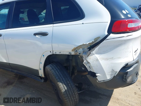 2016 Jeep Cherokee Sport with VIN 1C4PJMAB1GW314251, listed as a IAAI auction lot 41815330 with 124,588 mi miles. Bid and sale history available at carsss.com. Image 17.