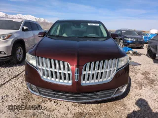2012 Lincoln MKT EcoBoost with VIN 2LMHJ5ATXCBL54259, listed as a Copart auction lot 50577315 with 138,574 mi miles and Salvage Title. Bid and sale history available at DreamBid. Image 5.