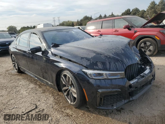 2020 BMW 7 Series with VIN WBA7U6C05LBM63050, listed as a Copart auction lot 71823944 with Not provided miles and Salvage title. Bid and sale history available at DreamBid. Image 4.