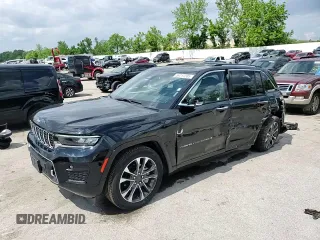 2023 Jeep Grand Cherokee Overland with VIN 1C4RJHDG0PC670537, listed as a Copart auction lot 56757285 with 24,735 mi miles and Salvage title. Bid and sale history available at DreamBid. Image 13.