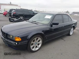 1998 BMW 7 Series with VIN WBAGF8323WDL57406, listed as a IAAI auction lot 42428227 with 93,448 mi miles and . Bid and sale history available at DreamBid. Image 2.