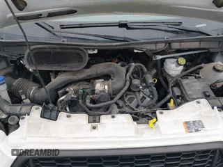2022 Ford Transit Cargo z VIN 1FTBR1X84NKA82407, wystawiony jako IAAI lot #41503201 z przebiegiem 53 194 mil mil oraz . Historia ofert i sprzedaży dostępna na DreamBid. Obrazek 10.