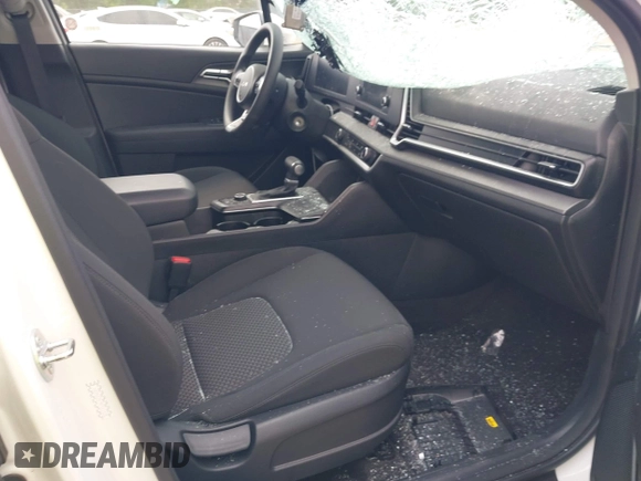 2024 Kia Sportage LX with VIN KNDPUCDF7R7311125, listed as a IAAI auction lot 41941739 with 22,242 mi miles and . Bid and sale history available at DreamBid. Image 5.