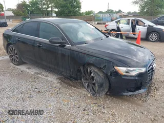 2013 Audi A6 2.0T Premium Plus with VIN WAUDFAFCXDN092084, listed as a IAAI auction lot 39810166 with 131,100 mi miles. Bid and sale history available at carsss.com. Image 1.