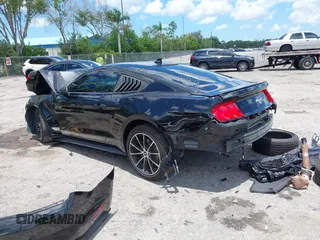 2020 Ford Mustang EcoBoost with VIN 1FA6P8TH9L5172336, listed as a IAAI auction lot 42488099 with 42,773 mi miles and . Bid and sale history available at DreamBid. Image 3.