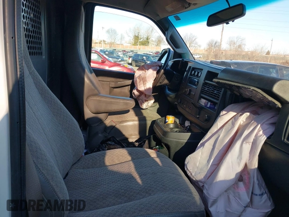 2018 Chevrolet Express Cargo Van with VIN 1GCWGAFG4J1338478, listed as a IAAI auction lot 41588218 with 88,990 mi miles. Bid and sale history available at carsss.com. Image 5.