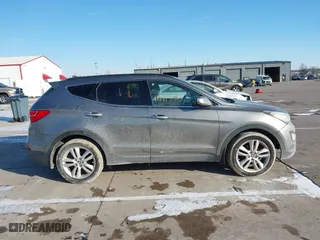 2013 Hyundai Santa Fe 2.0T Sport with VIN 5XYZUDLA0DG070122, listed as a IAAI auction lot 41413515 with 126,158 mi miles. Bid and sale history available at carsss.com. Image 14.