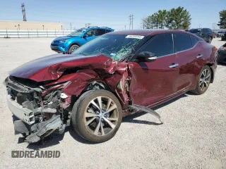 2018 Nissan Maxima Platinum z VIN 1N4AA6AP6JC409755, wystawiony jako Copart lot #56330365 z przebiegiem 71 618 mil mil oraz Szkoda całkowita • Salvage title. Historia ofert i sprzedaży dostępna na DreamBid. Obrazek 1.