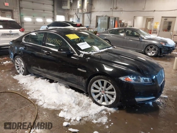 2014 Jaguar XF V6 SC with VIN SAJWJ0EF2E8U13746, listed as a IAAI auction lot 41608420 with 141,476 mi miles. Bid and sale history available at carsss.com. Image 1.