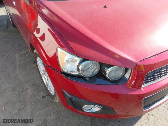 2016 Chevrolet Sonic LT with VIN 1G1JC5SH1G4117433, listed as a IAAI auction lot 42078979 with 167,201 mi miles. Bid and sale history available at carsss.com. Image 6.