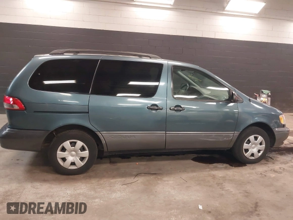 2003 Toyota Sienna CE with VIN 4T3ZF19C03U510244, listed as a IAAI auction lot 41441599 with 126,030 mi miles. Bid and sale history available at carsss.com. Image 13.