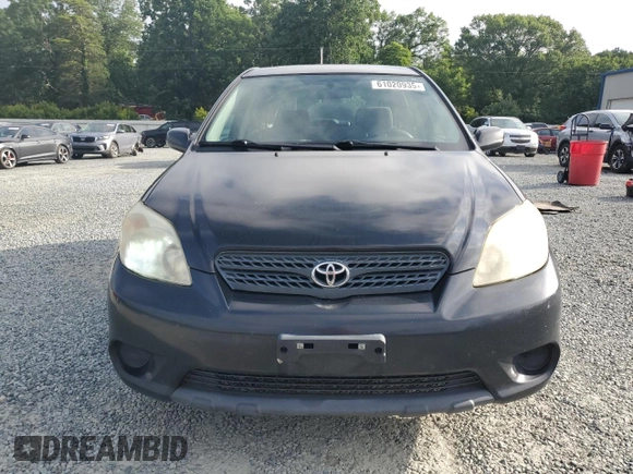 2006 Toyota Matrix STD with VIN 2T1KR32E06C574475, listed as a Copart auction lot 61020935 with 142,942 mi miles and Salvage title. Bid and sale history available at DreamBid. Image 5.