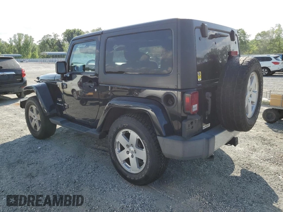 2012 Jeep Wrangler Sahara z VIN 1C4AJWBG6CL236704, wystawiony jako Copart lot #55099555 z przebiegiem 102 180 mil mil oraz Szkoda całkowita • Salvage title. Historia ofert i sprzedaży dostępna na DreamBid. Obrazek 2.