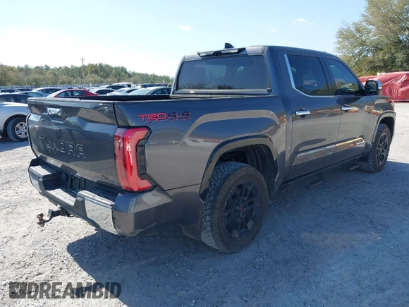 2022 Toyota Tundra 1794 Edition with VIN 5TFMA5DB9NX015571, listed as a IAAI auction lot 41730283 with 76,429 mi miles and . Bid and sale history available at DreamBid. Image 4.