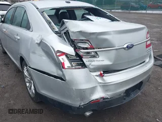 2014 Ford Taurus Limited with VIN 1FAHP2F81EG123933, listed as a IAAI auction lot 41843301 with 111,629 mi miles. Bid and sale history available at carsss.com. Image 6.