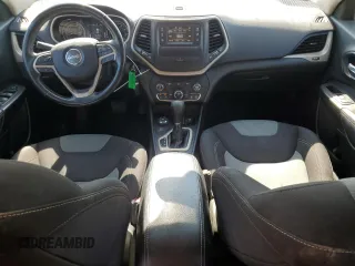 2015 Jeep Cherokee Sport with VIN 1C4PJMAB7FW773265, listed as a Copart auction lot 61134045 with 117,628 mi miles and Salvage title. Bid and sale history available at DreamBid. Image 8.