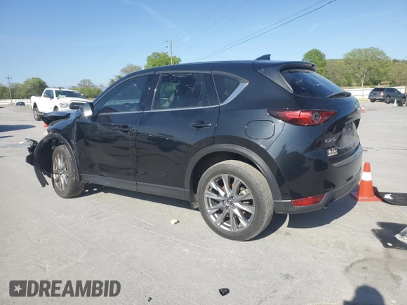 2021 Mazda CX-5 Grand Touring with VIN JM3KFADM2M0390669, listed as a Copart auction lot 53540805 with 150,092 mi miles and Clean Title. Bid and sale history available at carsss.com. Image 2.
