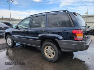 2004 Jeep Grand Cherokee Laredo with VIN 1J4GW48S84C200259, listed as a Copart auction lot 51002325 with 158,193 mi miles and Salvage Title. Bid and sale history available at carsss.com. Image 2.