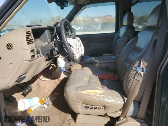 1997 GMC Suburban z VIN 3GKFK16R7VG514905, wystawiony jako Copart lot #77410934 z przebiegiem 193 116 mil mil oraz Szkoda całkowita • Salvage title. Historia ofert i sprzedaży dostępna na DreamBid. Obrazek 7.