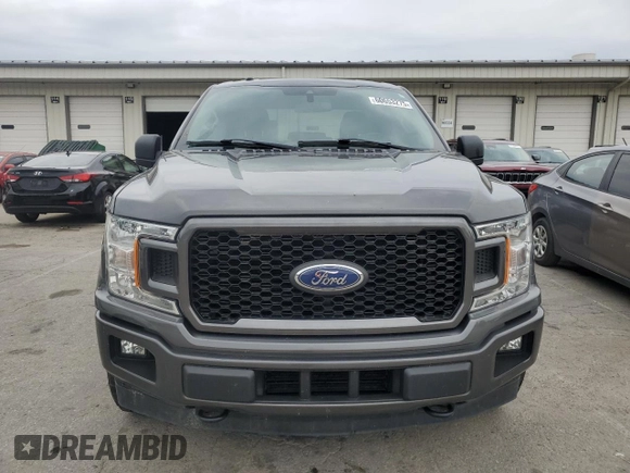 2019 Ford F-150 XL with VIN 1FTEX1EP9KKC47098, listed as a Copart auction lot 60653275 with 104,823 mi miles and Salvage title. Bid and sale history available at DreamBid. Image 5.