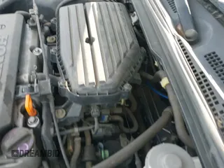 2002 Honda Civic with VIN 1HGEM21292L042403, listed as a IAAI auction lot 41253054 with 95,053 mi miles and . Bid and sale history available at DreamBid. Image 13.