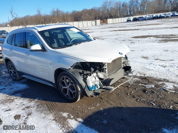 2018 BMW X1 xDrive28i with VIN WBXHT3C36J5L30217, listed as a IAAI auction lot 41237775 with 60,071 mi miles. Bid and sale history available at carsss.com. Image 1.