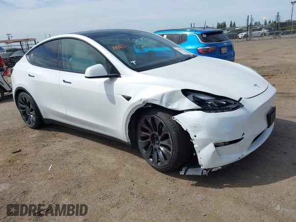 2021 Tesla Model Y Performance z VIN 5YJYGDEF7MF277769, wystawiony jako IAAI lot #42025157 z przebiegiem 28 522 mil mil oraz . Historia ofert i sprzedaży dostępna na DreamBid. Obrazek 1.