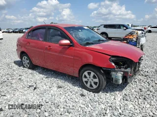 2011 Hyundai Accent GLS z VIN KMHCN4AC6BU621572, wystawiony jako Copart lot #57753025 z przebiegiem 108 395 mil mil oraz Szkoda całkowita • Salvage title. Historia ofert i sprzedaży dostępna na DreamBid. Obrazek 4.