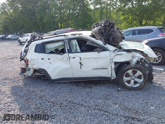 2018 Jeep Compass Latitude with VIN 3C4NJDBB4JT270975, listed as a IAAI auction lot 42477582 with 98,629 mi miles and . Bid and sale history available at DreamBid. Image 12.