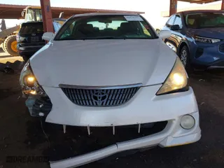 2004 Toyota Camry Solara SE with VIN 4T1CA38P54U005203, listed as a IAAI auction lot 41878752 with 194,959 mi miles. Bid and sale history available at carsss.com. Image 6.