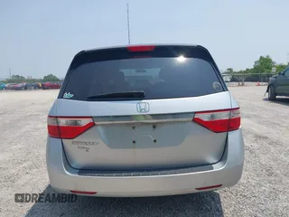 2012 Honda Odyssey EX z VIN 5FNRL5H44CB038825, wystawiony jako IAAI lot #42411401 z przebiegiem 214 164 mil mil oraz . Historia ofert i sprzedaży dostępna na DreamBid. Obrazek 16.