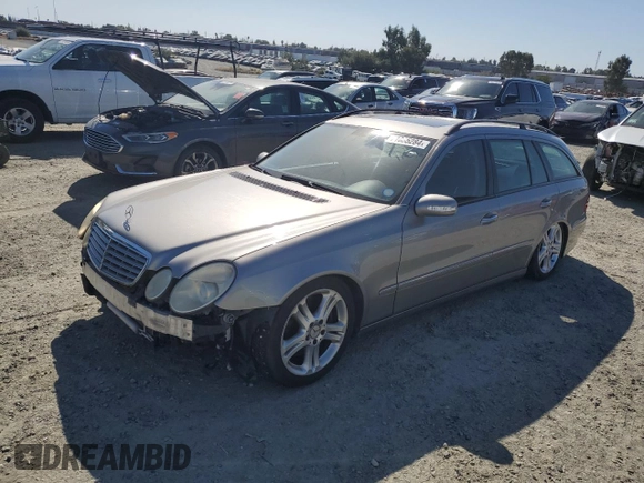 2006 Mercedes-Benz E 500 with VIN WDBUH83J96X194071, listed as a Copart auction lot 71035284 with 121,818 mi miles and Salvage Title. Bid and sale history available at carsss.com. Image 1.