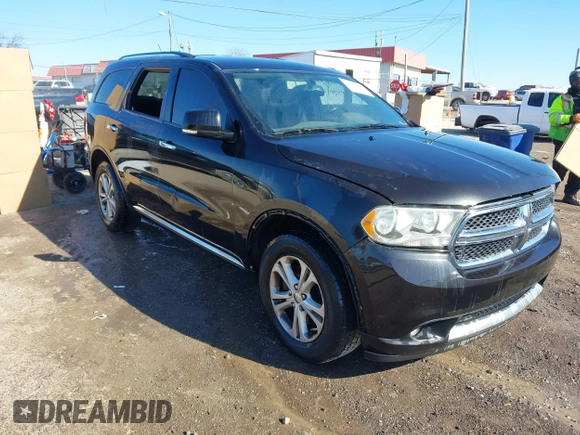 2013 Dodge Durango Crew with VIN 1C4SDHDT3DC553939, listed as a IAAI auction lot 41404491 with 148,505 mi miles and . Bid and sale history available at carsss.com. Image 1.