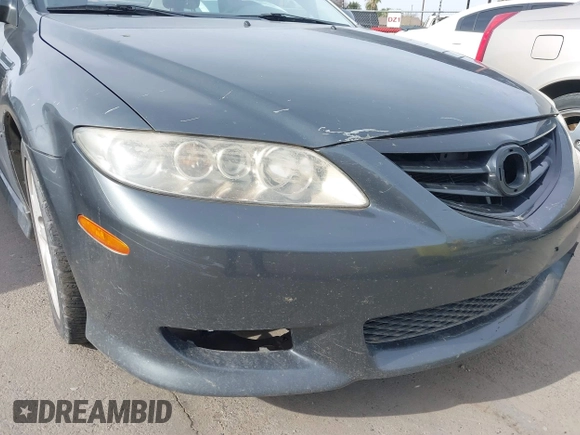 2004 Mazda Mazda6 s with VIN 1YVFP80D345N47144, listed as a IAAI auction lot 41675948 with 190,571 mi miles. Bid and sale history available at carsss.com. Image 12.
